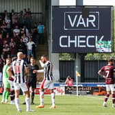 Hearts' Peter Haring awaits the result of his red card which has now been rescinded after a tackle on St Mirren's Mark O'Hara.