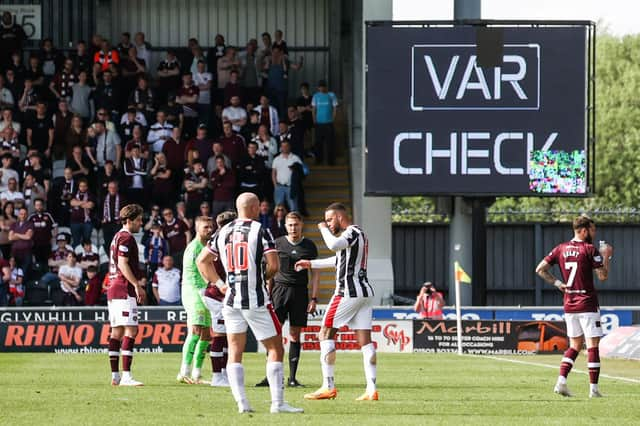 Hearts' Peter Haring awaits the result of his red card which has now been rescinded after a tackle on St Mirren's Mark O'Hara.