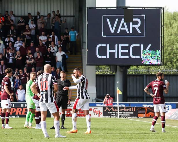Hearts' Peter Haring awaits the result of his red card which has now been rescinded after a tackle on St Mirren's Mark O'Hara.