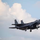 An F15 fighter jet landing at RAF Lakenheath, Suffolk after an American fighter jet crashed into the North Sea while on a training exercise.