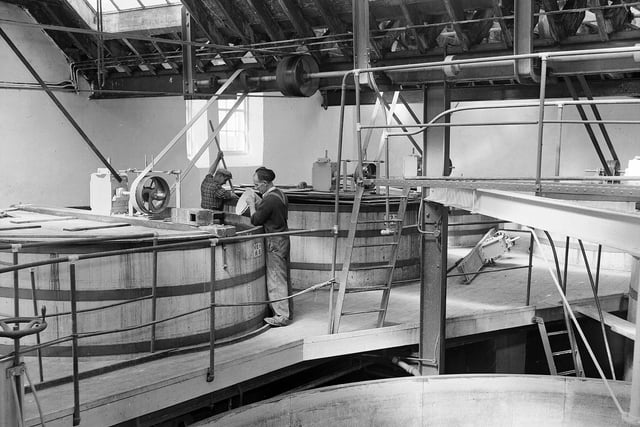 Workers at the Highland Park Distillery, in Orkney's Kirkwall, in August 1959.