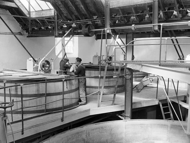 Workers at the Highland Park Distillery, in Orkney's Kirkwall, in August 1959.