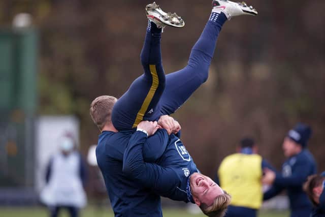 Stuart Hogg gets a lift from Duhan van der Merwe during training. Picture: Craig Williamson / SNS