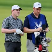 Bob MacIntyre and caddie Mike Burrow prepare to play a shot on the first hole during the third round of the 106th PGA Championship at Valhalla Golf Club in Louisville, Kentucky. Picture: Andy Lyons/Getty Images.