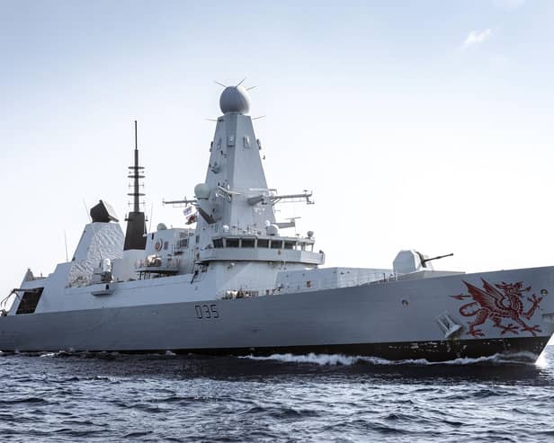 Photograph of HMS Dragon at sea.