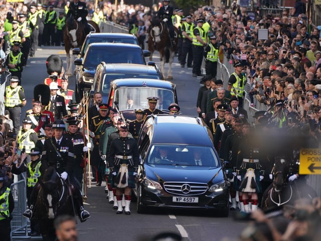 King Charles III and members of the royal family join the procession of Queen Elizabeth's coffin from the Palace of Holyroodhouse to St Giles' Cathedral, Edinburgh.Picture date: Monday September 12, 2022.