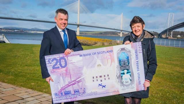 Celebration: The new £20 note entered circulation on Friday.
