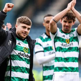 James Forrest takes the acclaim of the Celtic fans after his match-winning double against Dundee at Dens Park.  (Photo by Ross Parker / SNS Group)