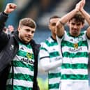 James Forrest takes the acclaim of the Celtic fans after his match-winning double against Dundee at Dens Park.  (Photo by Ross Parker / SNS Group)