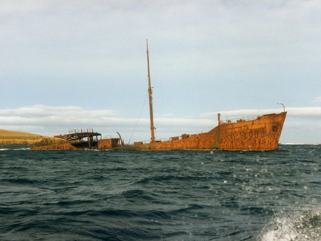 During WWI, sturdy defences were put in place around Scapa Flow in Orkney - a large, calm body of water where the Royal Navy would berth their warships in security. Such defences included a number of blockships sunk in both WWI and WWII to stop German submarines from reaching the area and attacking the ships berthed there. After the sinking at anchor of HMS Royal Oak in 1939 at the hands of a U-boat that had infiltrated the sound, Winston Churchill ordered the construction of the Churchill Barriers to replace the blockships.