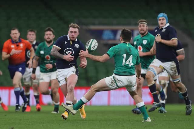 Scotland captain Stuart Hogg looks to chip past Ireland's Hugo Keenan. Picture: Brian Lawless/Getty Images
