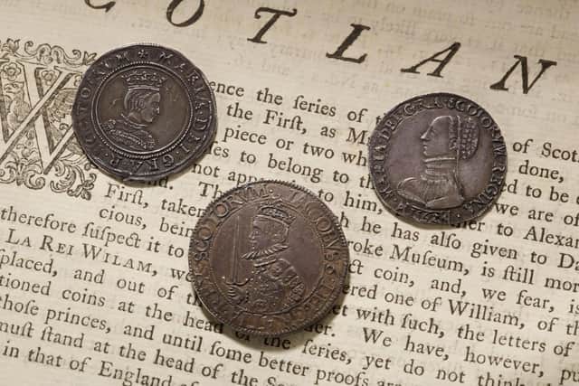 The two 16th Century coins of Mary Queen of Scots (top left and top right) being sold at auction in Zurich. PIC: Contributed.
