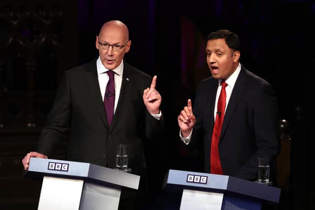 John Swinney of the SNP, left, and Anas Sarwar of Labour take part in BBC Scotland's UK General Election Debate at The University Of Glasgow in June 2024 (Picture: Jeff J Mitchell/Getty Images)