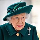 The Queen arrives for the opening of the sixth session of the Scottish Parliament.