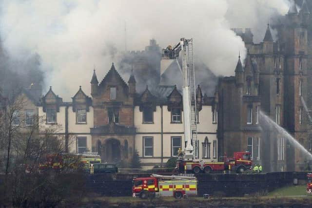 Two guests died in the Cameron House Hotel fire, sparked by the remains of a log fire being dumped in a cupboard next to kindling