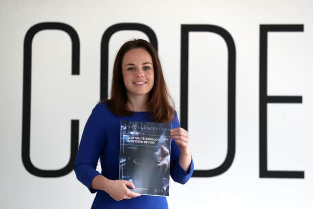 Forbes holds a copy of the Scottish Technology Ecosystem Review by Logan. Picture: Andrew Milligan/PA Wire.