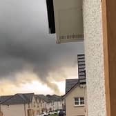 A tornado was spotted in Scotland as heavy rain and thunderstorms swept parts of the country.