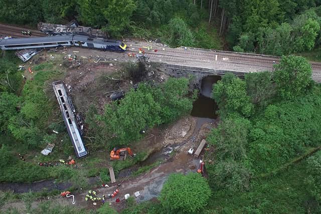 The train hit the parapet of a bridge after derailing on debris washed onto the track. Picture: Rail Accident Investigation Branch