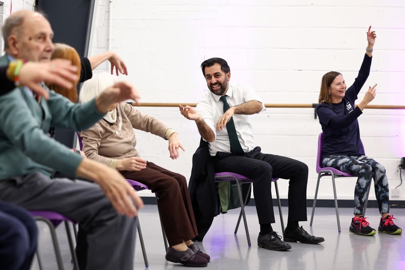 Humza Yousaf takes part in a dance performance during a visit to the Edinburgh Community Performing Arts re-connect project