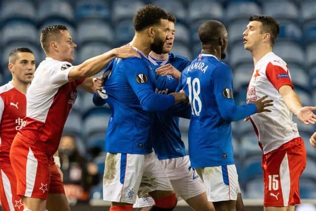 Ondrej Kudela (right) is confronted by Glen Kamara and Connor Goldson at Ibrox on March 18. The Slavia Prague defender has now been banned for 10 games by UEFA for racist abuse of Rangers midfielder Kamara. (Photo by Alan Harvey / SNS Group)