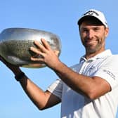 Oliver Wilson poses with the trophy after winning the Made in HimmerLand in Denmark. Picture: Stuart Franklin/Getty Images.