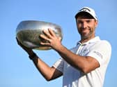 Oliver Wilson poses with the trophy after winning the Made in HimmerLand in Denmark. Picture: Stuart Franklin/Getty Images.