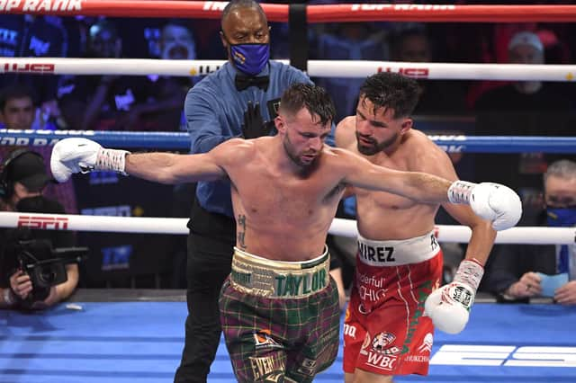 Josh Taylor and Jose Ramirez exchange words during their world unification title fight in Las Vegas. Taylor won by unanimous decision. (Photo by David Becker/Getty Images)