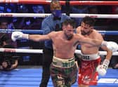 Josh Taylor and Jose Ramirez exchange words during their world unification title fight in Las Vegas. Taylor won by unanimous decision. (Photo by David Becker/Getty Images)