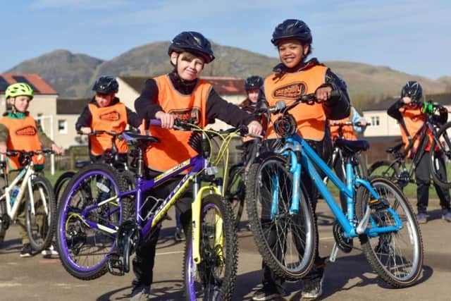 Children from Banchory Primary School in Tullibody making use of bikes from the hubs. Picture: Forth Environment Link