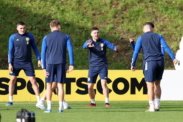 Scotland captain Andy Robertson holds court during a training session on Wednesday. (Photo by Ian MacNicol/Getty Images)
