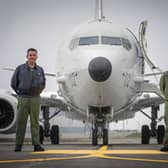 Group Captain Chris Layden and Wing Commander James Hanson, in front of a submarine-hunting Poseidon MRA1 plane at RAF Lossiemouth (Picture: Jane Barlow/PA)