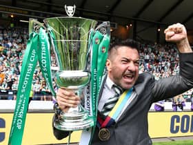 Celtic manager Fran Alonso celebrates with the Scottish Cup after the 2-0 win over Rangers in the Hampden final.  (Photo by Ross MacDonald / SNS Group)