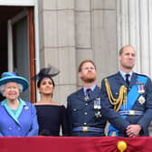 (Left to right) Queen Elizabeth II, the Duchess of Sussex, Duke of Sussex, and the Duke and Duchess of Cambridge (now the Prince and Princess of Wales) watching the RAF 100th anniversary flypast from the balcony of Buckingham Palace. Picture: Paul Grover/Daily Telegraph/PA Wire