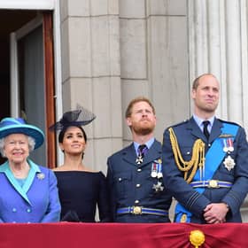 (Left to right) Queen Elizabeth II, the Duchess of Sussex, Duke of Sussex, and the Duke and Duchess of Cambridge (now the Prince and Princess of Wales) watching the RAF 100th anniversary flypast from the balcony of Buckingham Palace. Picture: Paul Grover/Daily Telegraph/PA Wire