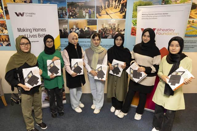Afghan students receive their iPads from Wheatley Group