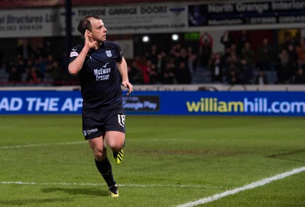 Paul McGowan scoring for Dundee in a defeat to Hibs the last time the teams met before Sunday's match at Easter Road. Picture: SNS