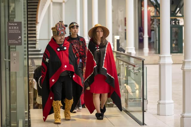 Three members from the House of Ni’isjoohl — Sim’oogit Ni’isjoohl (Chief Earl Stephens), Noxs Ts’aawit (Dr Amy Parent), and Shawna McKay — on a visit to the Living Lands gallery at the National Museum of Scotland, where the House of Ni'isjoohl Memorial Pole is currently on display. Picture: Neil Hanna