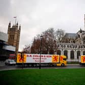 Lorries from Scottish seafood companies drive past the Houses of Parliament last month, in a protest action by fishermen against post-Brexit red tape.