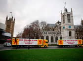 Lorries from Scottish seafood companies drive past the Houses of Parliament last month, in a protest action by fishermen against post-Brexit red tape.
