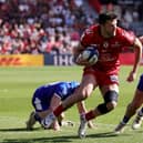 Blair Kinghorn of Stade Toulousain breaks clear to score his team's third try during the Investec Champions Cup quarter-final win over Exeter Chiefs at Stade Ernest Wallon on April 14, 2024 in Toulouse, France. (Photo by David Rogers/Getty Images)