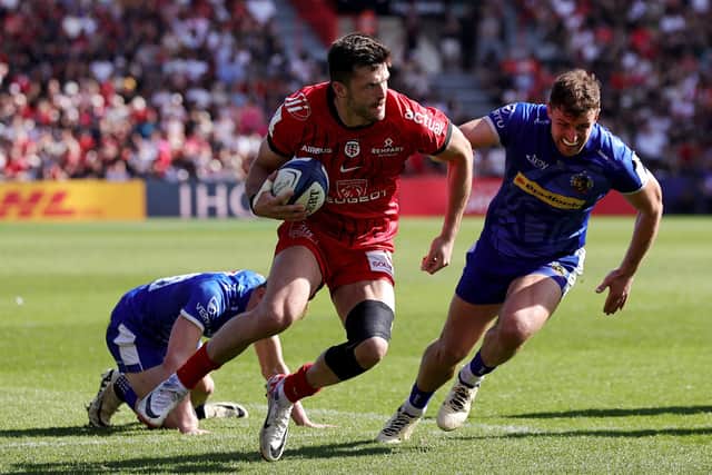 Blair Kinghorn of Stade Toulousain breaks clear to score his team's third try during the Investec Champions Cup quarter-final win over Exeter Chiefs at Stade Ernest Wallon on April 14, 2024 in Toulouse, France. (Photo by David Rogers/Getty Images)