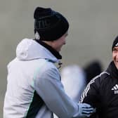 Brendan Rodgers shares a smile with David Turnbull during a Celtic training session.