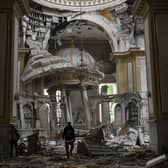 Church personnel inspect damages inside the Odesa Transfiguration Cathedral in Odesa, Ukraine, in July 2023, following Russian missile attacks. Picture: AP Photo/Jae C. Hong