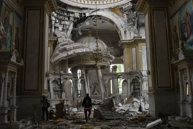 Church personnel inspect damages inside the Odesa Transfiguration Cathedral in Odesa, Ukraine, in July 2023, following Russian missile attacks. Picture: AP Photo/Jae C. Hong