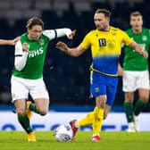 Hibs midfielder Scott Allan in action against Chris Kane and Ali McCann during St Johnstone's Betfred Cup semi-final victory. Photo by Craig Williamson / SNS Group