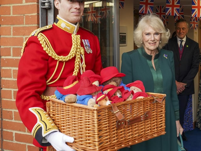 During the visit, Camilla gave the children Paddington bear toys which members of the public had left at the Long Walk in Windsor and outside Buckingham Palace following the Queen’s death in September.