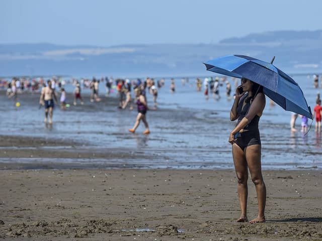 Members of the public at Portobello Beach amid today's heatwave. Picture: Lisa Ferguson