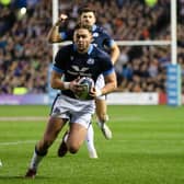 Ollie Smith scores a try against Australia in October, with Blair Kinghorn cheering him on in the background. The pair will start against Italy.  (Photo by Craig Williamson / SNS Group)