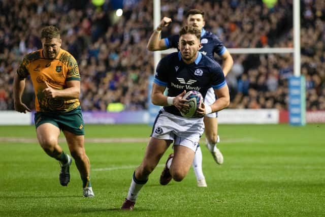 Ollie Smith scores a try against Australia in October, with Blair Kinghorn cheering him on in the background. The pair will start against Italy. (Photo by Craig Williamson / SNS Group)