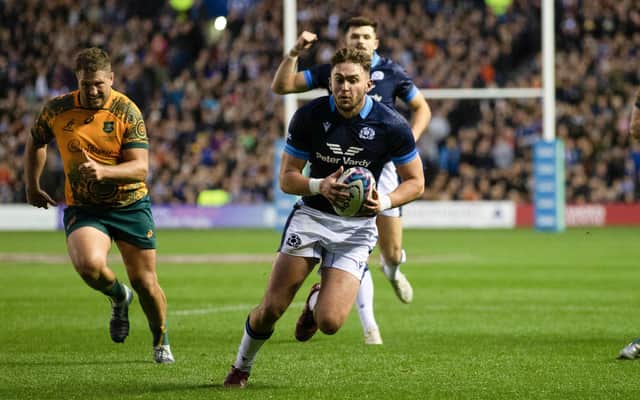 Ollie Smith scores a try against Australia in October, with Blair Kinghorn cheering him on in the background. The pair will start against Italy. (Photo by Craig Williamson / SNS Group)